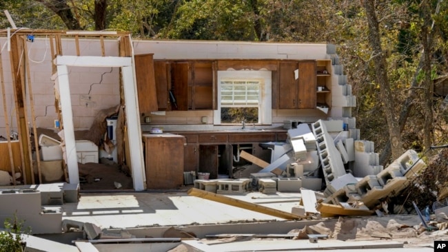 Damaged to one of the White family's homes that was destroyed by Hurricane Helene is seen in Morganton, North Carolina, Oct. 1, 2024.