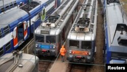 Transilien trains, the suburban railway service of French state-owned railway company SNCF, are parked at a SNCF depot station in Charenton-le-Pont near Paris, France, May 31, 2016 as railway workers will start a national railway strike on Tuesday evening