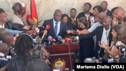 Opposition candidate Lutero Simango talks to the press after casting a vote at the Josina Machel secondary high school in Maputo, Mozambique, Oct. 9, 2024.