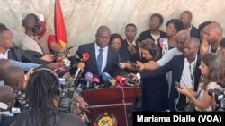 Opposition candidate Lutero Simango talks to the press after casting a vote at the Josina Machel secondary high school in Maputo, Mozambique, Oct. 9, 2024.