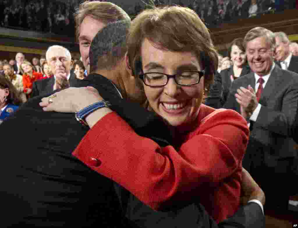 President Barack Obama embraces Rep. Giffords before his State of the Union address Tuesday, Jan. 24, 2012, on Capitol Hill in Washington. (AP)