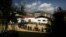 FILE- In this March 24, 2008 file photo, Bhutanese people queue up to cast their votes outside a polling station, in Thimphu, Bhutan.Bhutan’s COVID-19 vaccination drive was fast from the start. As other countries rolled out their vaccination campaigns…