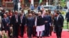 India's Prime Minister Narendra Modi waves as he arrives for Mauritius' 57th National Day celebrations at the Champ De Mars, Port Louis, Mauritius, March 12, 2025. 