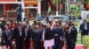 India's Prime Minister Narendra Modi waves as he arrives for Mauritius' 57th National Day celebrations at the Champ De Mars, Port Louis, Mauritius, March 12, 2025. 