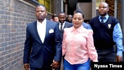 FILE - Bushiri (left) and his wife Mary walk into the court in South Africa. (Photo courtesy of 'Nyasa Times')