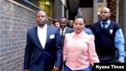 FILE - Bushiri (left) and his wife Mary walk into the court in South Africa. (Photo courtesy of 'Nyasa Times')