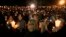Community members gather for a candlelight vigil for those killed in a shooting at Umpqua Community College in Roseburg, Oregon, Oct. 1, 2015. 