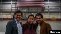 Nury Turkel, left, Ayshem Mamut, center, and Mamut Turkel on Nov. 27, 2024, at Joint Base San Antonio in Texas, following Ayshem Mamut's arrival from China. (Photo courtesy of Nury Turkel)