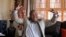 Thamsanqa Jantjie gestures at his home during an interview with The Associated Press in Johannesburg, South Africa, Dec. 12, 2013.