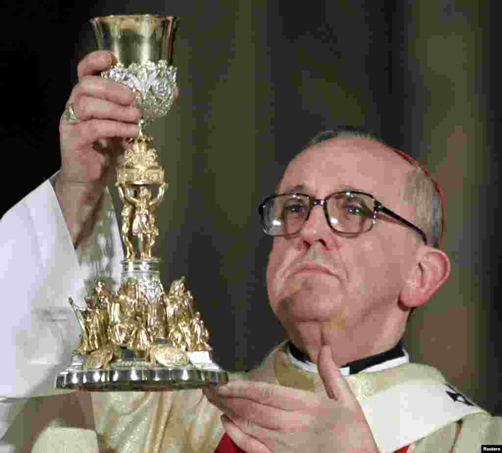 Argentine Cardinal Bergoglio conducts a mass in honor of Pope John Paul II at the Buenos Aires cathedral. Argentine Cardinal Jorge Mario Bergoglio conducts a mass in honor of Pope John Paul II at the Buenos Aires' cathedral, April 4, 2005. Cardinal Bergo