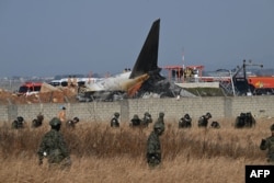 South Korea mourns as investigators probe cause of deadly plane crash