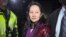 FILE - Huawei Technologies Chief Financial Officer Meng Wanzhou as she exits the court registry following the bail hearing at British Columbia Superior Courts in Vancouver, British Columbia on Dec. 11, 2018.