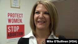 Trump supporter Dr. Kelli Ward is running for the U.S. Senate, from a small office in Phoenix, Arizona, Feb 19, 2017. She looks to Trump to reverse the ACA, to cut taxes and to make more cautious use of the U.S. military.