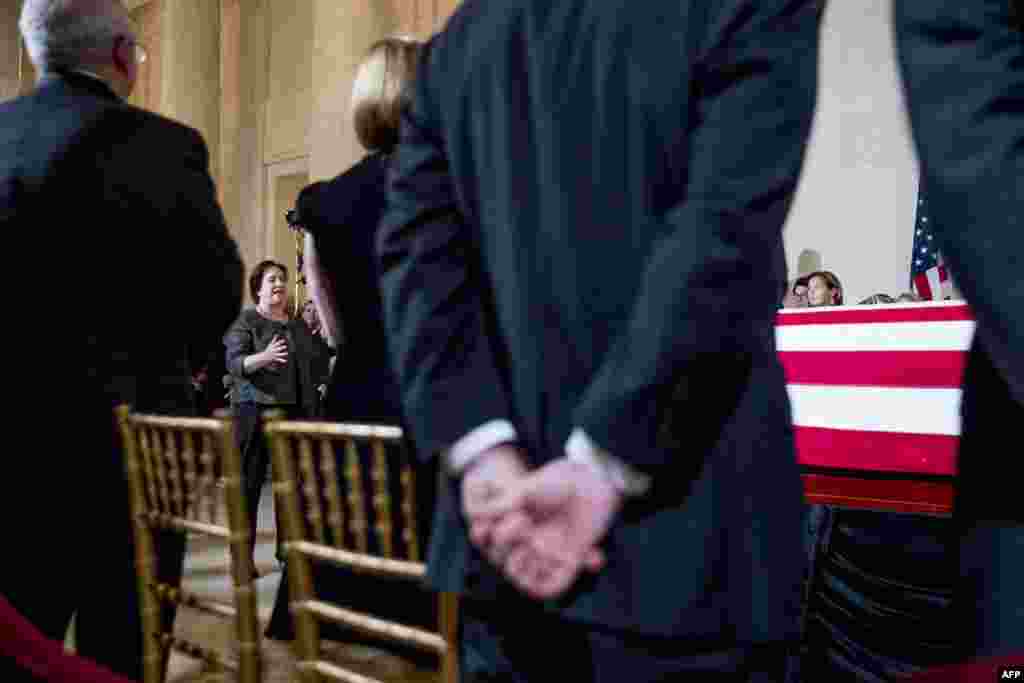 Associate Justice Elena Kagan speaks at a private ceremony in the Great Hall of the Supreme Court in Washington, where late Supreme Court Justice John Paul Stevens lies in repose.