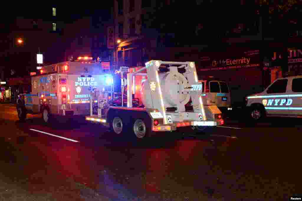 A New York City Police Department (NYPD) truck tows a spherical chamber carrying a second explosive device from near the site of an explosion in the Chelsea neighborhood of Manhattan, New York, Sept. 18, 2016.