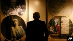 A man attends the launch of the World Digital Library in Paris, Tuesday April 21, 2009. 