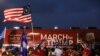 People take part in an event to show their support for U.S. President Donald Trump in Macomb County, Michigan