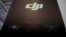 A DJI logo is seen at a security exhibition in Shanghai, China May 24, 2019. 