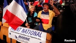 Supporters for Marine Le Pen, French National Front (FN) political party leader and candidate for French 2017 presidential election, attend a campaign rally in Nice, France, April 27, 2017. 