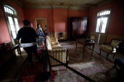 FILE - Visitors walk through the Whitney Plantation in Edgard, La., July 14, 2017.