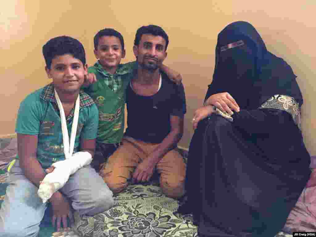 Yemeni refugees Wasiim Said Mohamed, second from right, his wife and their two children are shown in their one-room home in Hargeisa, Somaliland, March 31, 2016.