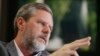 FILE - Liberty University President Jerry Falwell Jr. gestures during an interview in his offices at the school in Lynchburg, Va., Nov. 16, 2016. 