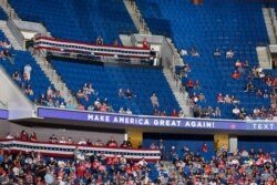 FILE - Empty seats are pictured during a Trump campaign rally at the BOK Center, June 20, 2020, in Tulsa, Okla.