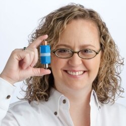 Amy Prieto holds a prototype of the battery she invented, Prieto battery.