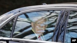 Former National security adviser John Bolton leaves his home in Bethesda, Maryland, Jan. 28, 2020. 