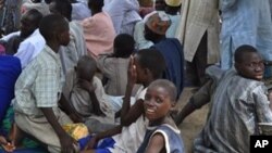 Wasu 'yan gudun hijira da suka arcewa daga garuruwansu a saboda hare haren 'yan Boko Haram.