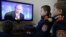 Cadets watch Russian President Vladimir Putin's annual news conference on television, Rostov-on-Don, Dec. 20, 2012.