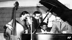 Arif Mardin (far right) and his classmates, at VOA in the early 1960s.