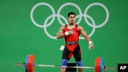 L'égyptien Mohamed Ihab Youssef en finale des 77kg aux Jeux Olympiques de Rio le 10 août 2016.