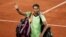 FILE - Spain's Rafael Nadal waves to the crowd after losing to Serbia's Novak Djokovic in their semifinal match of the French Open tennis tournament at the Roland Garros stadium in Paris, June 11, 2021. 