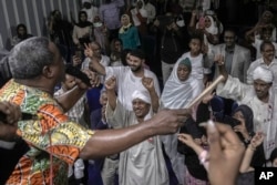 Sudanese Camirata group founder Dafallah el-Hag performs during a show at the Russian culture center in Cairo, Sept. 15, 2024.