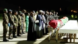 Religious officials hold a ceremony for the remains of the people who died in a military helicopter crash that killed Kenya's military chief, General Francis Ogolla, in Nairobi