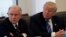 FILE - Donald Trump sits with U.S. Senator Jeff Sessions at Trump Tower in Manhattan, New York, Oct. 7, 2016. 