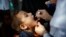 Egypt has begun a new round of vaccinations against polio, one of several national efforts in the Middle East after the crippling disease recently resurfaced in war-torn Syria, Cairo, Nov. 17, 2013. (Yuli Weeks for VOA)