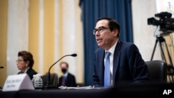 Treasury Secretary Steven Mnuchin speaks during a Senate Small Business and Entrepreneurship hearing to examine implementation of Title I of the CARES Act, Wednesday, June 10, 2020 on Capitol Hill in Washington. (Al Drago/Pool via AP)