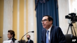 FILE - Treasury Secretary Steven Mnuchin speaks during a Senate Small Business and Entrepreneurship hearing to examine implementation of Title I of the CARES Act, June 10, 2020 on Capitol Hill in Washington.