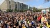 Activists attend a rally to demand authorities allow opposition candidates to run in an upcoming local election, and release protesters detained during recent demonstrations, in Moscow, Russia, Aug. 31, 2019.