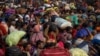 Devotees wait to enter a railway station as they leave after attending the "Maha Kumbh Mela"— also known as the Great Pitcher Festival — a day after a deadly stampede, in Prayagraj, India, Jan. 30, 2025.