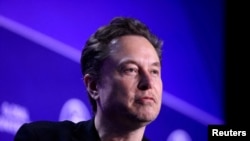 FILE PHOTO: Tesla CEO Elon Musk in Beverly Hills, California/Reuters