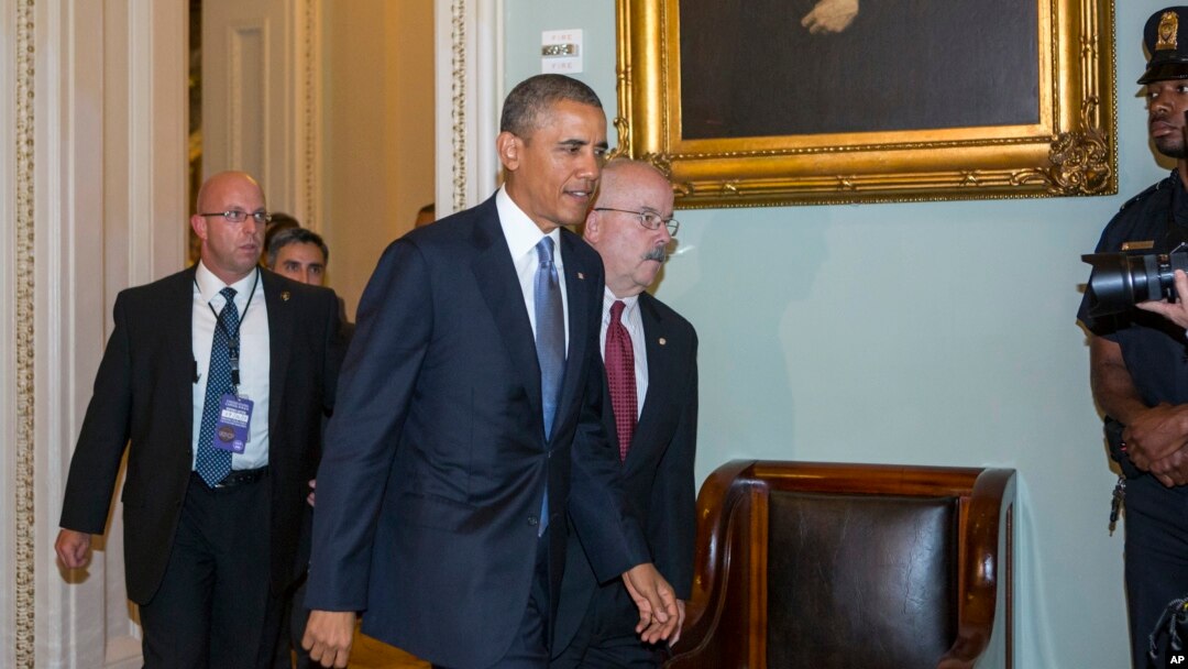 President Barack Obama arrives on Capitol Hill to meet with Senate Democrats and Republicans on Syria, Sept. 10, 2013.