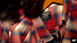 FILE - Clothing from American brand Abercrombie & Fitch, which was made in China, is seen for sale at a store in Beijing.