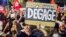 A protester holds a banner reading " Nahda go away" during a demonstration against Tunisia's Islamist-led government, Augusr 6, 2013 in Tunis.