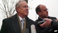 Robert Goldberg, the US embassy's deputy chief of mission, speaks to journalists outside the Beijing High People's Court