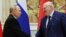 FILE - Russian President Vladimir Putin, left, and Belarusian President Alexander Lukashenko shake hands during a signing ceremony in Minsk, Belarus, Dec. 6, 2024.