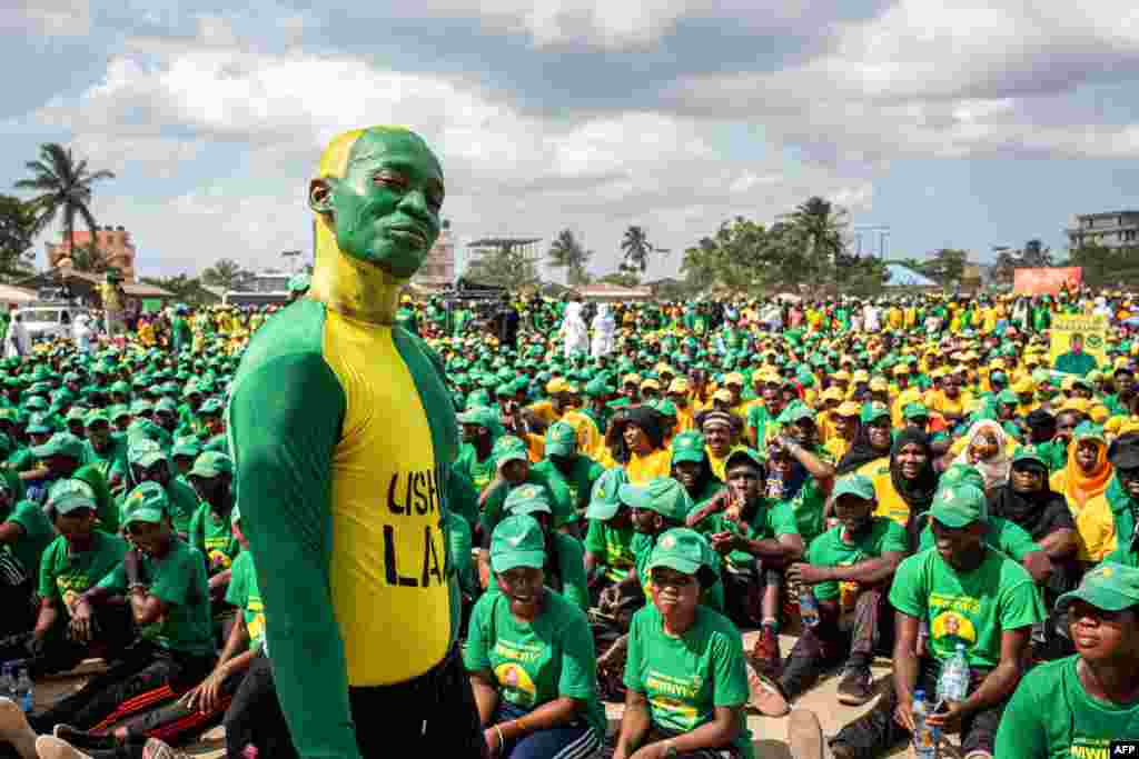 Supporters of the Tanzanian ruling party Chama Cha Mapinduzi (Revolutionary Party), gather at the Kibanda Maiti Stadium, during the last campaign rally in Stone Town ahead of the national elections.