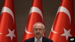 FILE - Turkey's main opposition Republican People's Party leader Kemal Kilicdaroglu speaks during a meeting with journalists in Istanbul.